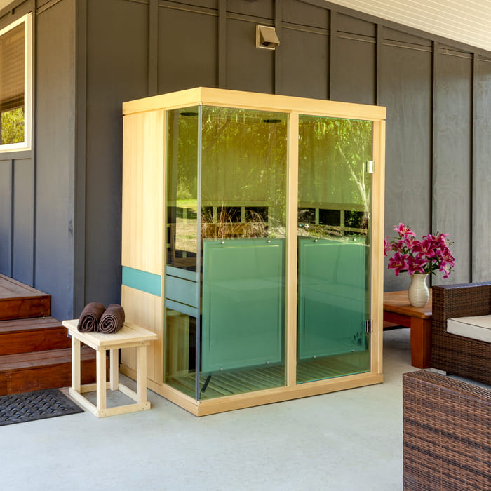 Front view of Evolve 30 Infrared Sauna by Sun Stream, designed for three people with premium Canadian Hemlock wood and modern glass door.