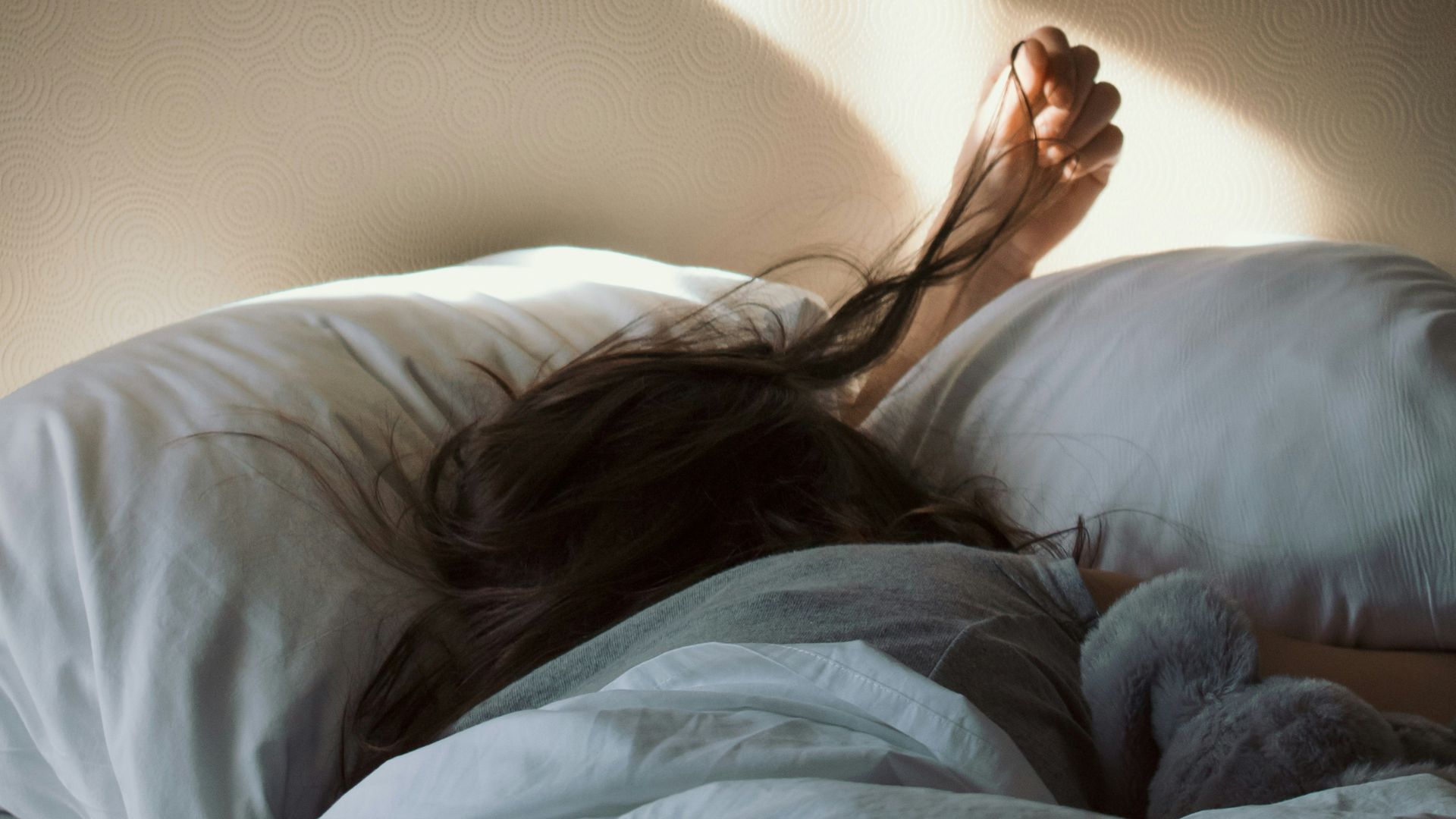 Woman suffering from general physical fatigue, in need of infrared sauna session