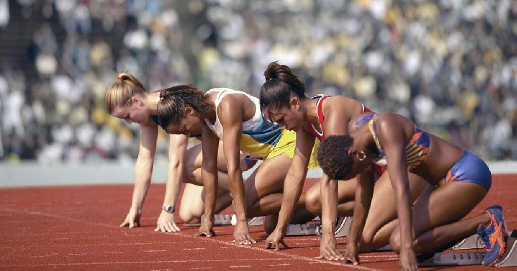 infrared sauna lactic acid - Sprinters lined up at starting blocks