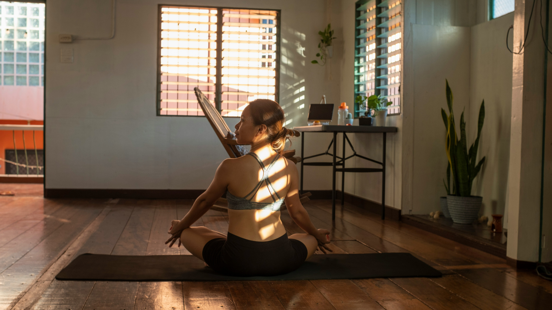 Woman practicing mindfulness in her home